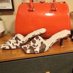 Anne Michelle Brown and White Cow-Print Slide Mules